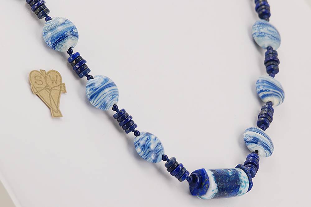 Unique cobalt blue and white glass bead necklace with lapis lazuli.