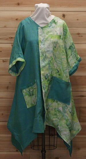 Turquoise blue and spring green linen cloak with 2 large front pockets.