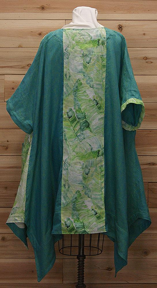 Spring green and turquoise, Irish linen cloak, featuring two large front pockets.