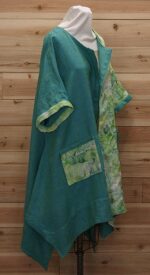 Chic turquoise blue and spring green linen cloak, featuring 2 large front pockets.