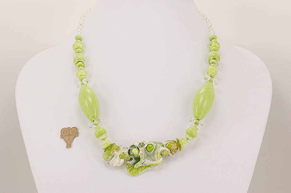 necklace made with lime green and ivory colored Italian Murrini glass beads