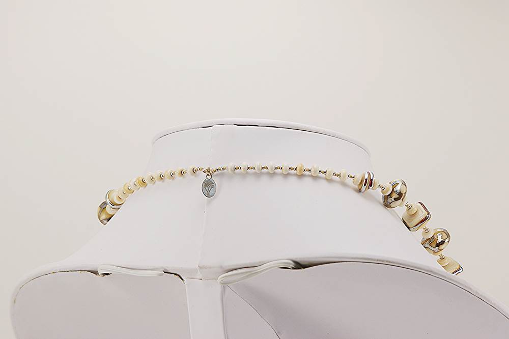 silver accented ivory color glass beaded necklace
