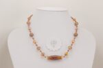 peachy colored glass bead necklace