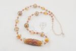 peachy colored glass bead necklace