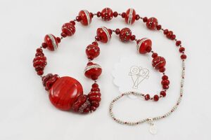 necklace with red glass beads and sterling silver accents