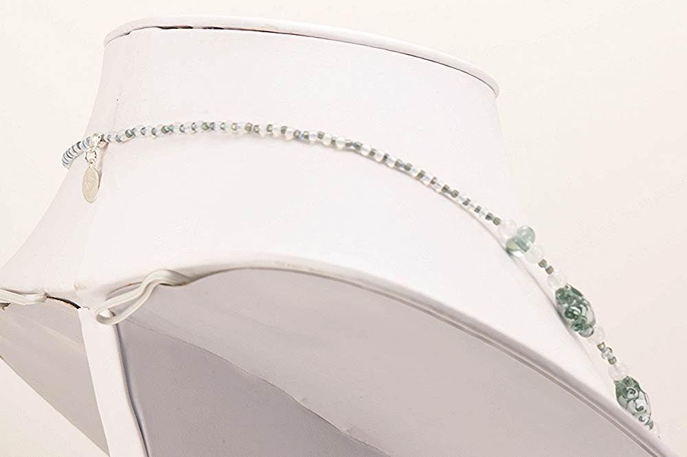 White and gray beaded necklace.