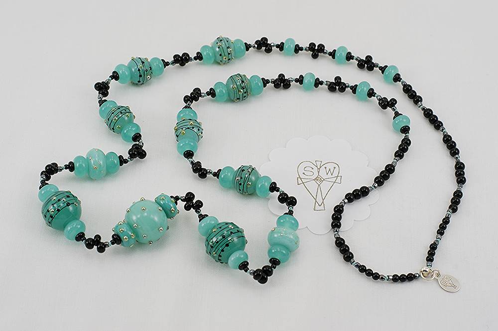 Kryptonite foam green colored glass bead necklace.