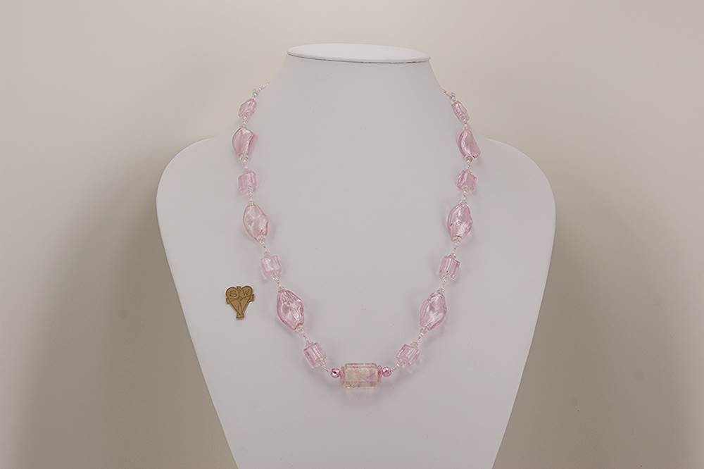 pink glass beaded necklace with quartz crystal and sterling silver