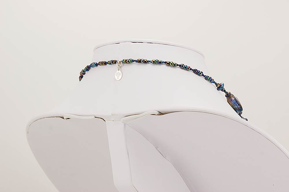 metallic blue glass bead necklace with sterling silver accents