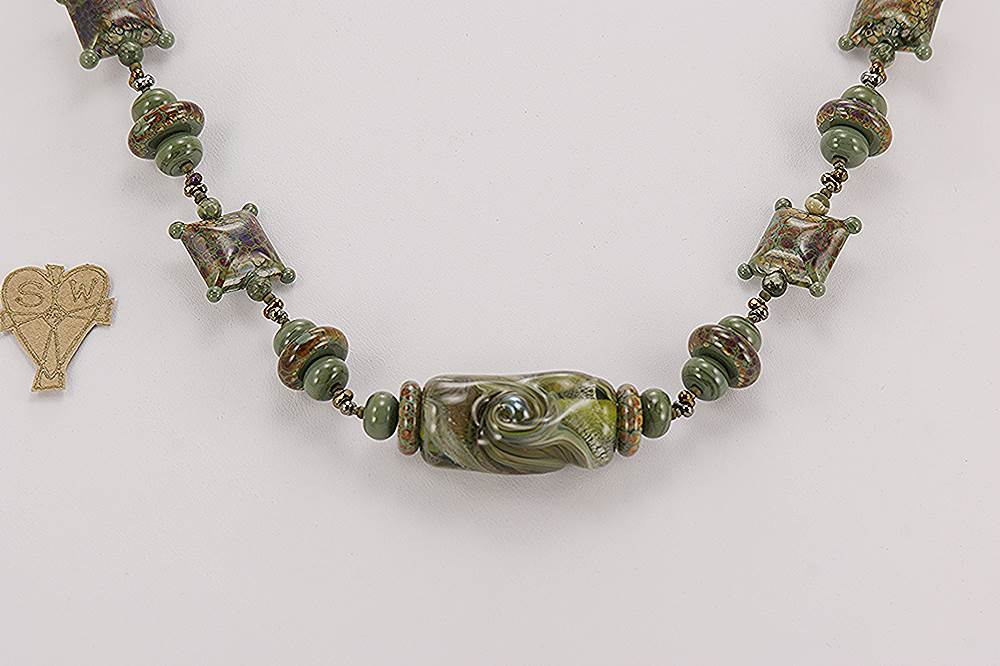 Olive green glass beaded necklace with moss agate semi precious stone beads.