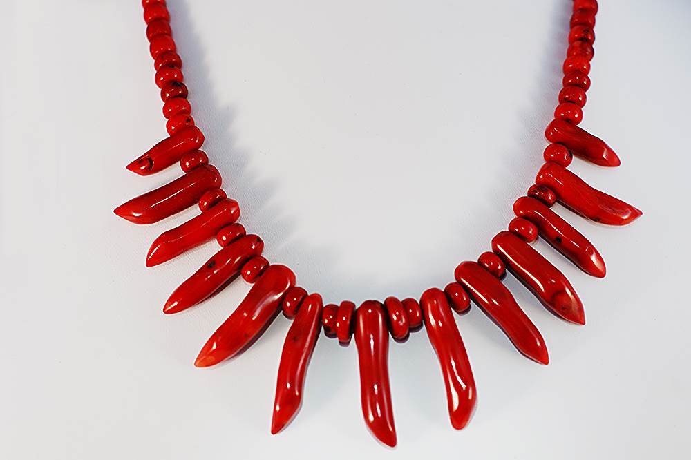 Red coral bead and horn necklace.