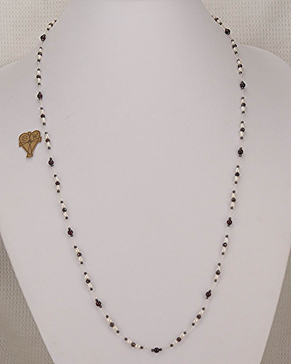 Black cherry ruby necklace with freshwater pearls and hematite beads.