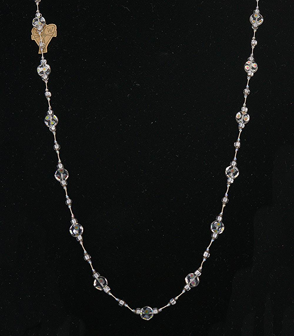 Silver reflective glass necklace with raku spots.