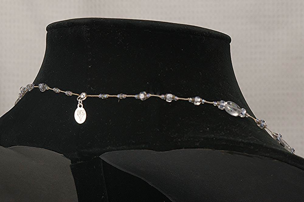Reflective mercury glass bead necklace.