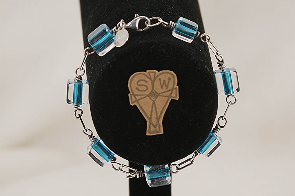 Turquoise glass beaded bracelet with sterling silver.