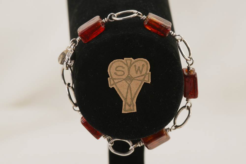 Unique, Venetian , dichroic, glass bead bracelet with sterling silver.