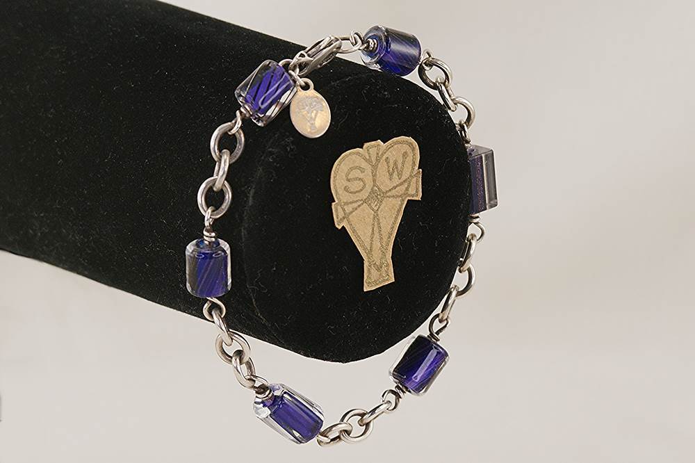 Deep purple glass bead bracelet with sterling silver.