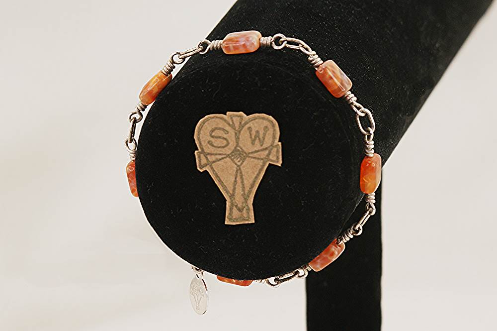 Tangerine orange, sunstone and sterling silver bracelet.