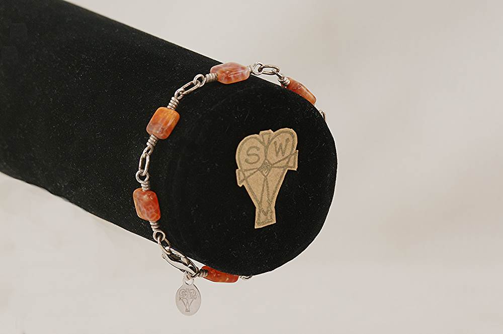 Handmade, orange sunstone and sterling silver bracelet.