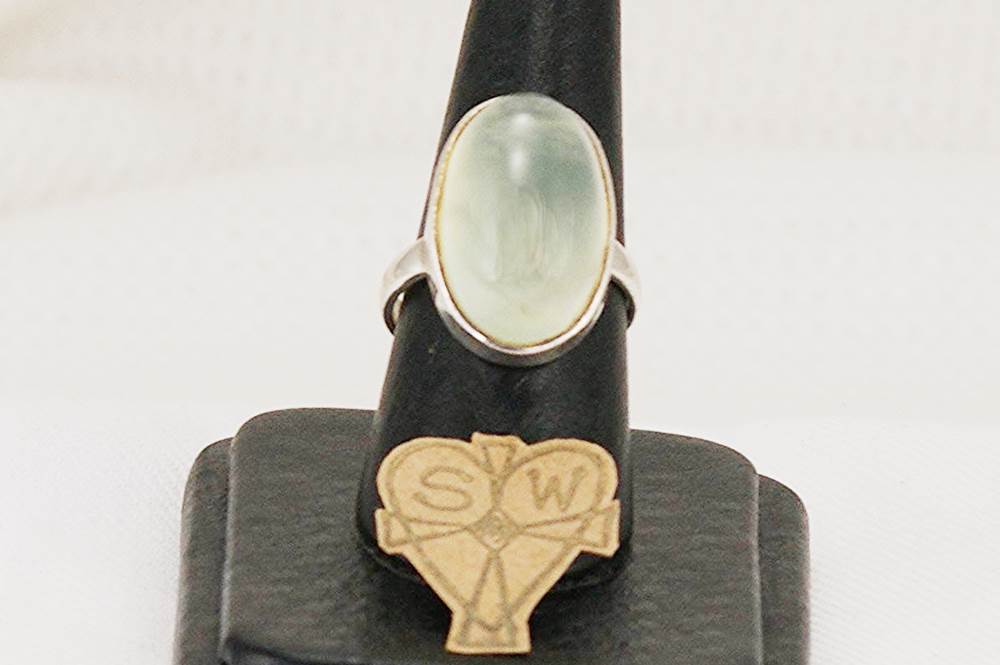 Unique, handmade ring with new jade and sterling silver.