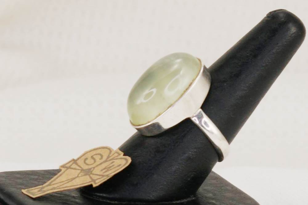 Sterling silver ring with new jade semi precious stone.