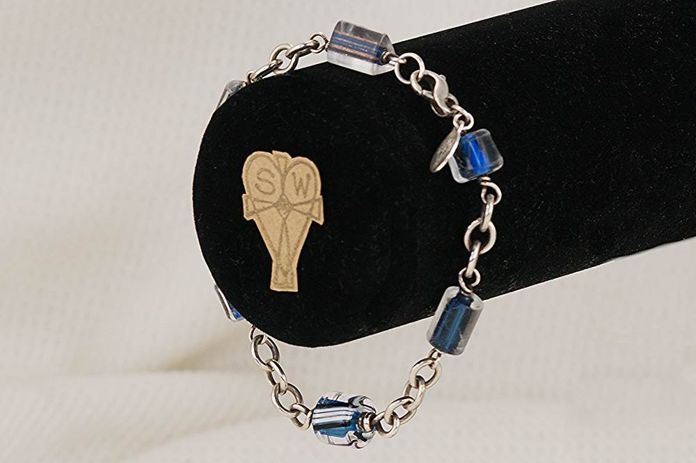 Ocean blue glass bead and sterling silver handmade bracelet.
