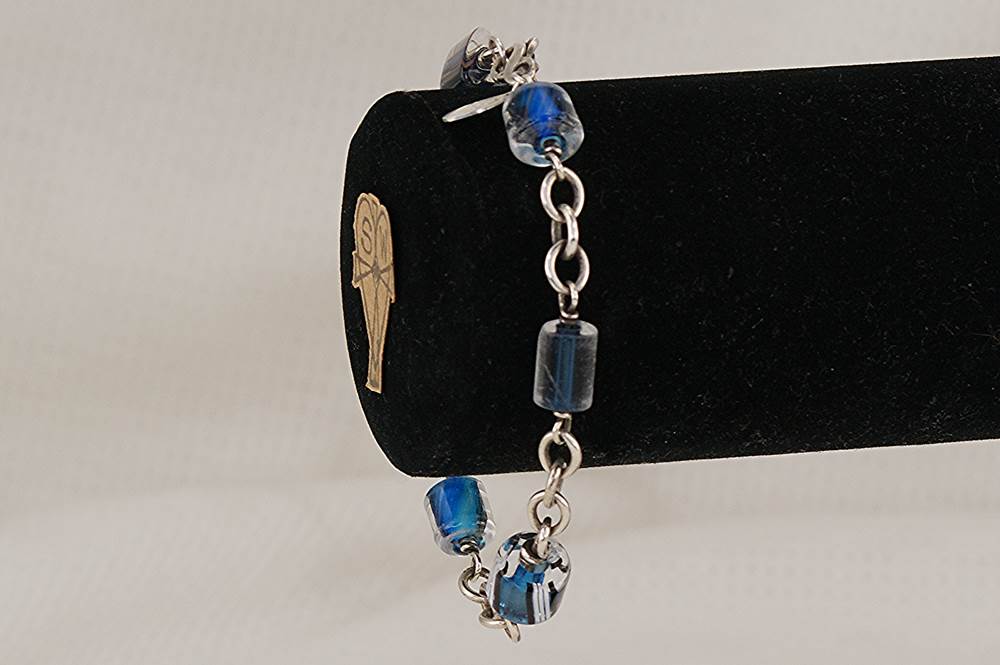 Ocean blue glass bead bracelet with heavy gauge sterling silver.