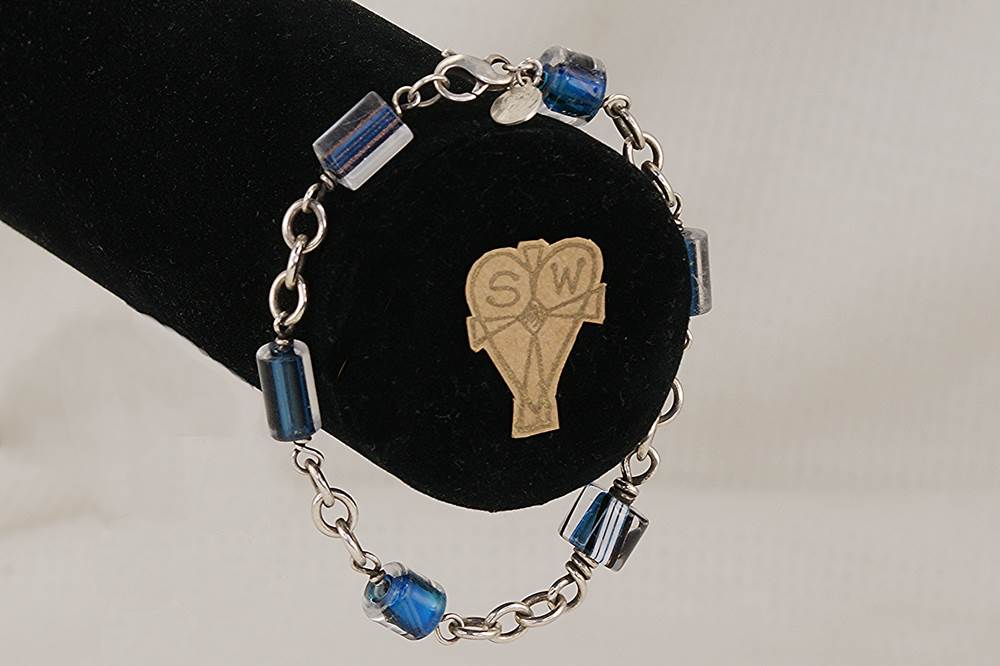 Ocean blue glass bead bracelet with sterling silver.