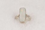 White opal and sterling silver ring.