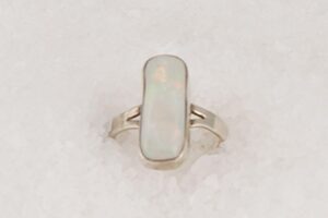 White opal and sterling silver ring.