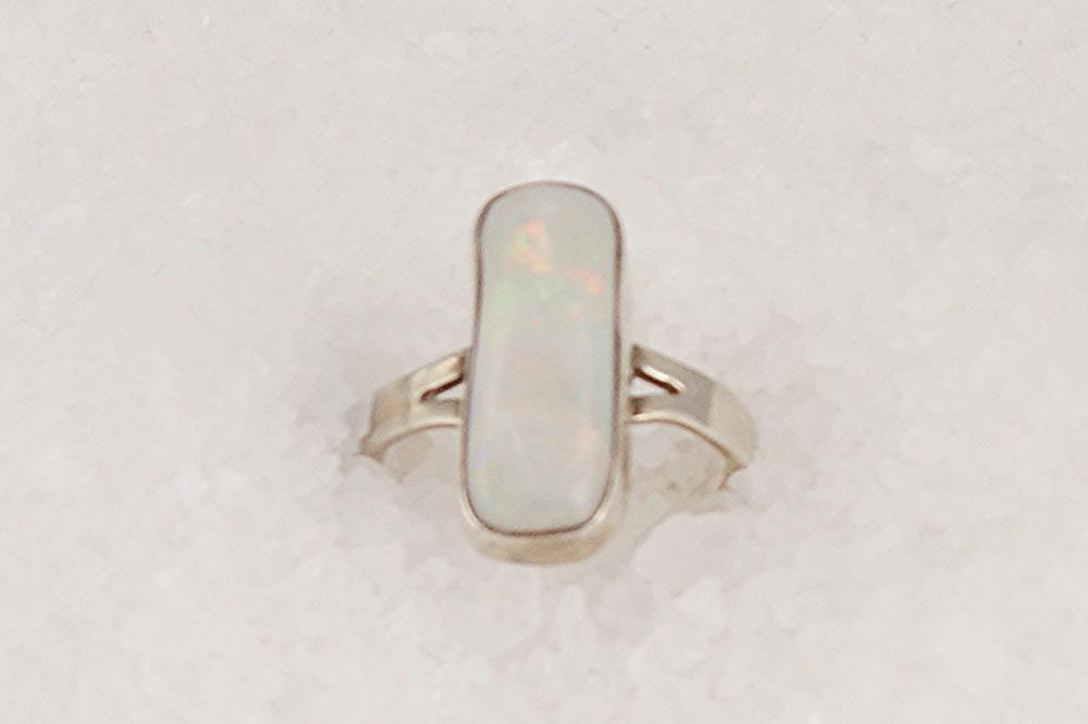 White opal and sterling silver ring.