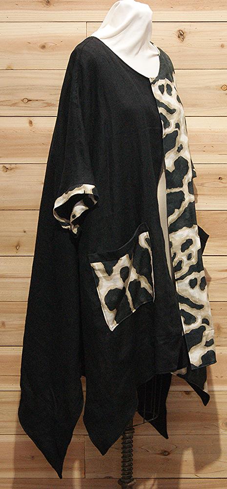 Beige on black 100% Italian linen cloak with 2 large front pockets.