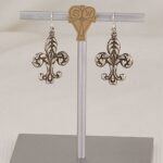 Solid sterling silver fleur de lis earrings.