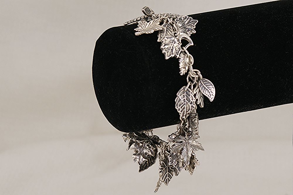 Handmade , solid sterling silver leaf charm bracelet.