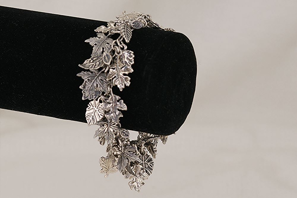 Handmade sterling silver leaf charm bracelet.