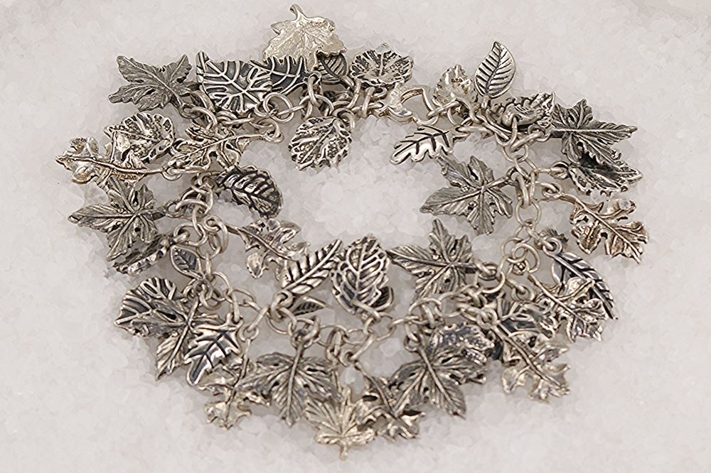 Handmade sterling silver leaf charm bracelet.