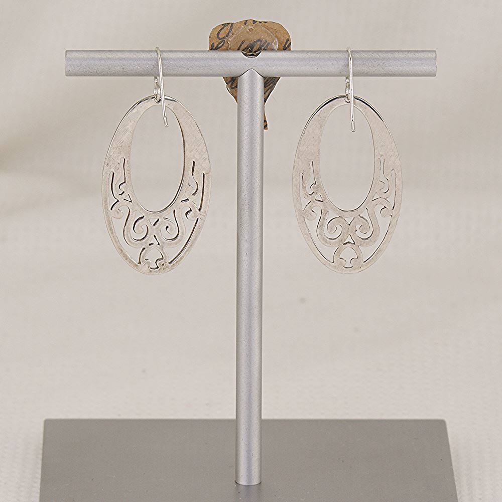 Handmade, oval scroll cut sterling silver earrings.