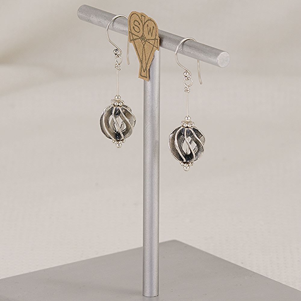 Sterling silver spiral ball bird cage earrings.