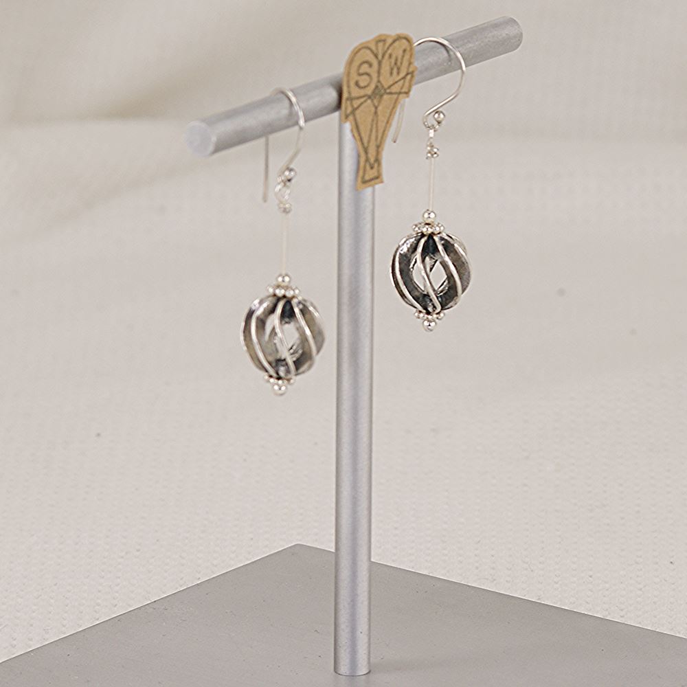 Spiral ball earrings made of sterling silver.