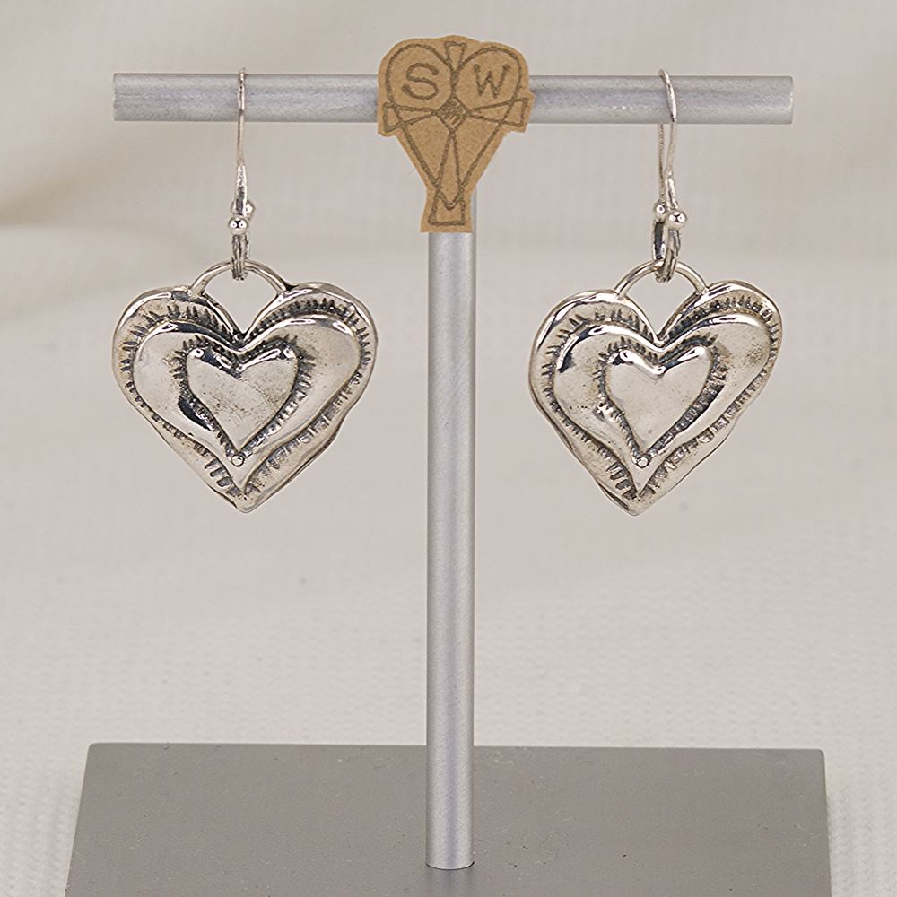 Handmade solid sterling silver heart earrings.