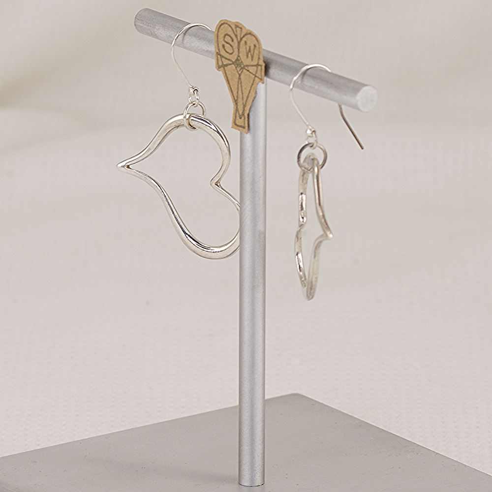 Handmade silver dimensional heart earrings.