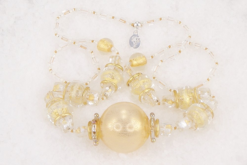 One of a kind necklace made of blown quartz glass with 18kt gold leaf and gold lined seed beads.