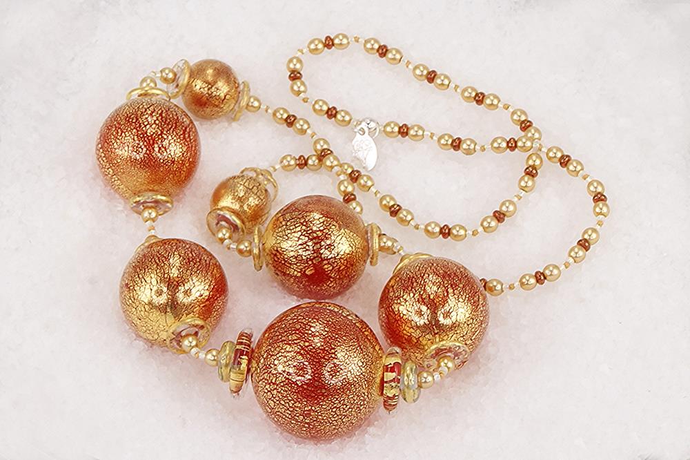 One of a kind red and gold leaf glass bead necklace..