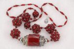 One of a kind red and sterling silver glass bead necklace.