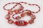 One of a kind red dichroic glass bead necklace.